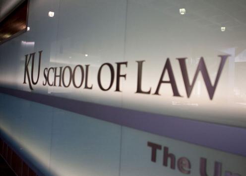 KU School of Law logo in the law building's commons area