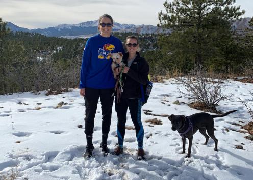 Leah Lewsader with her wife and their two dogs