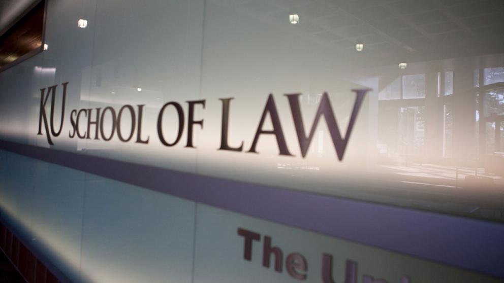 KU Law logo on the wall in the First Floor Commons of Green Hall